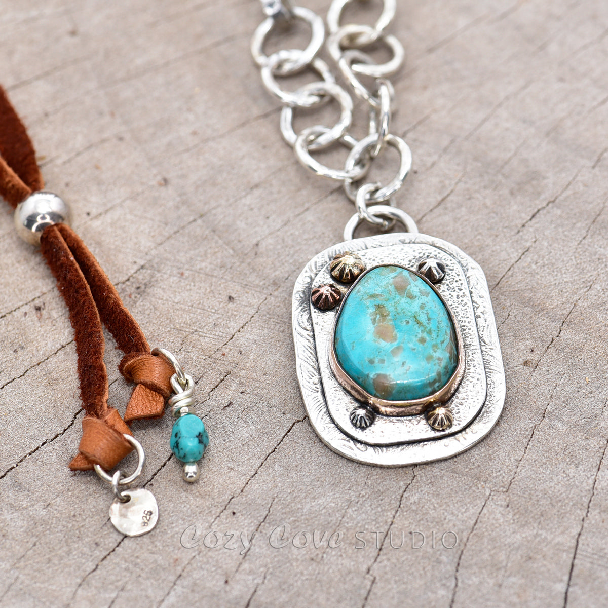 Boho style pendant necklace with turquoise in a hand crafted setting of  sterling silver with 14k gold accents and a 14k gold fill bezel. (N723)