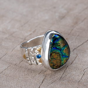 Fused dichroic  ring in a hand crafted setting of sterling silver